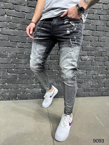 Модные мужские джинсы с потертостями