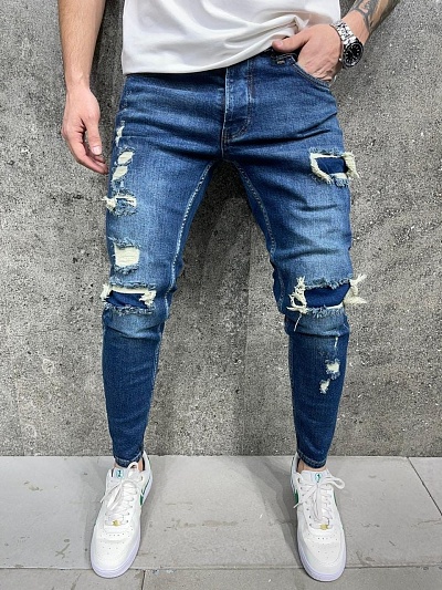 Зауженные джинсы с потертостями